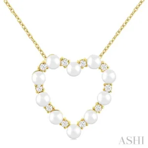 1/5 Ctw Heart Shape 3 MM Cultured Pearl and Round Cut Diamond Pendant With Chain in 14K Yellow Gold