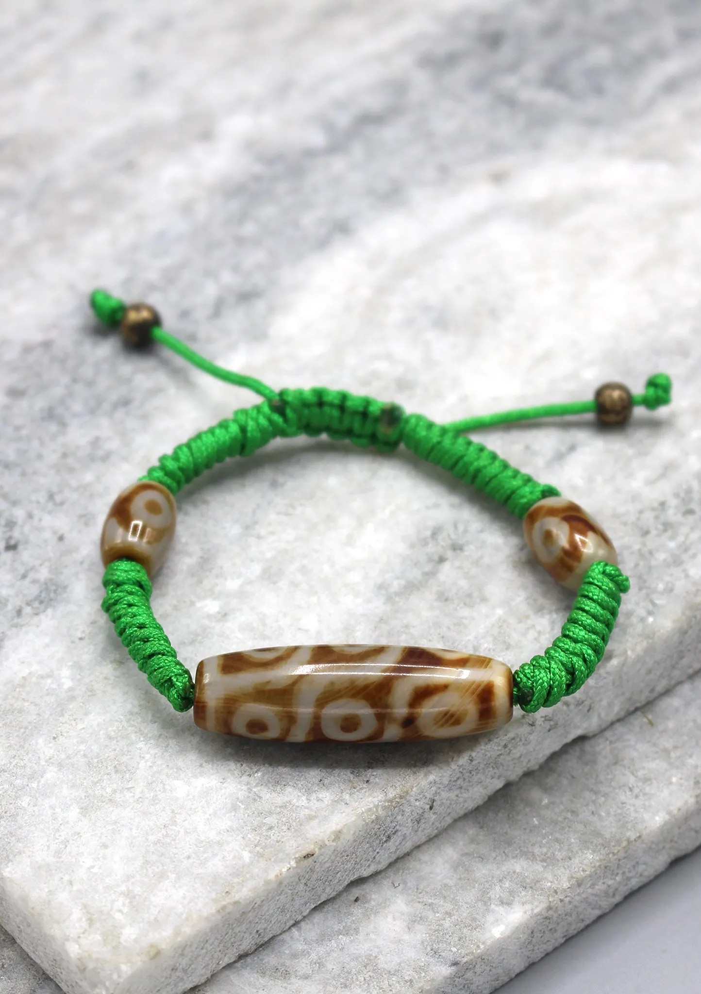 9 Eyes Dzi Bead on Lucky Knot Tibetan Bracelet