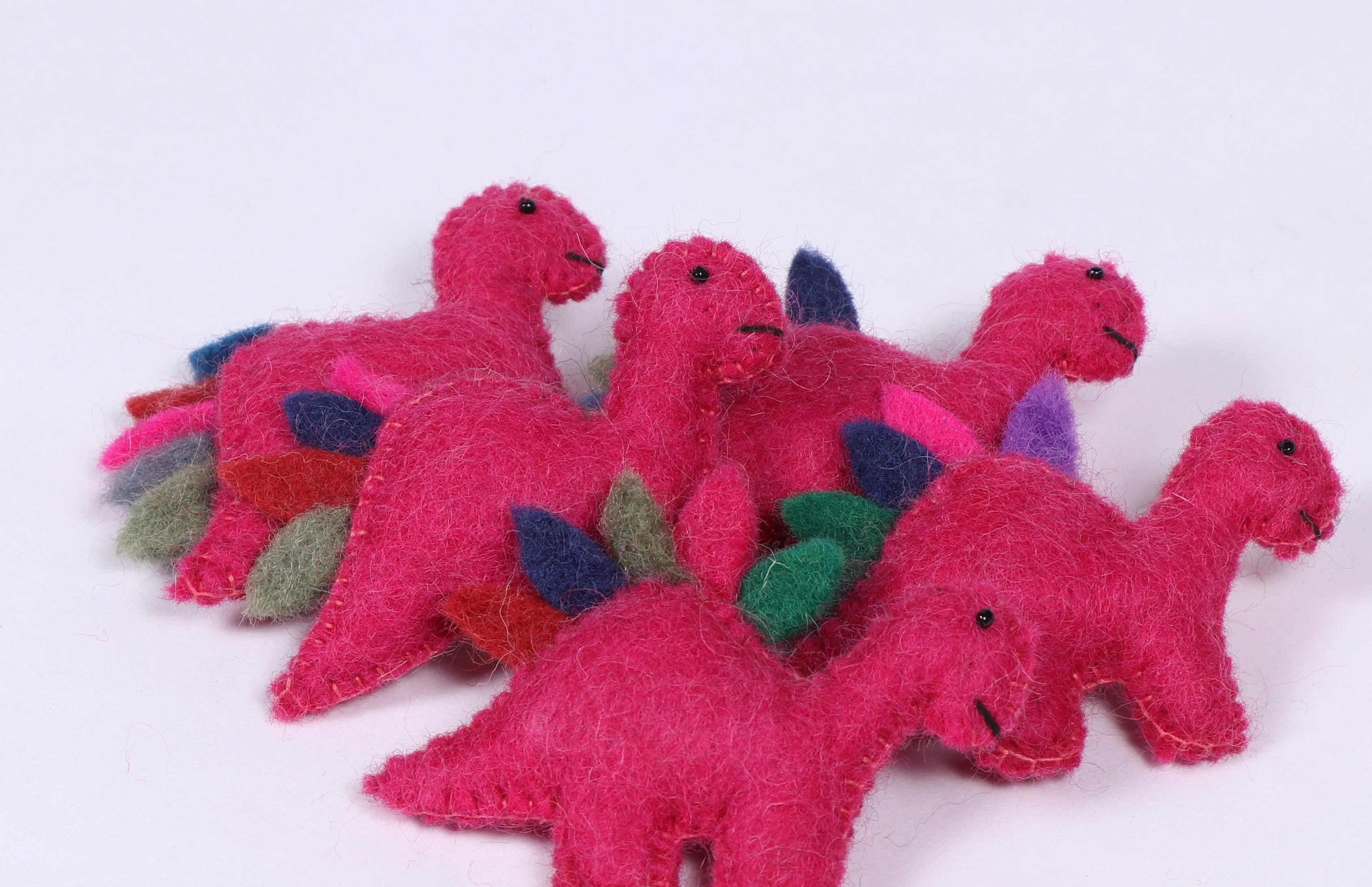 Handmade dinosaur felt brooches