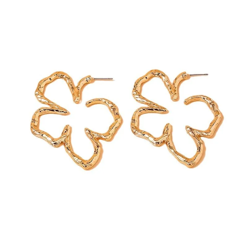 Stylish Vienna Verve Metal Earrings with Irregular Hollow Flower Design for Wholesale.